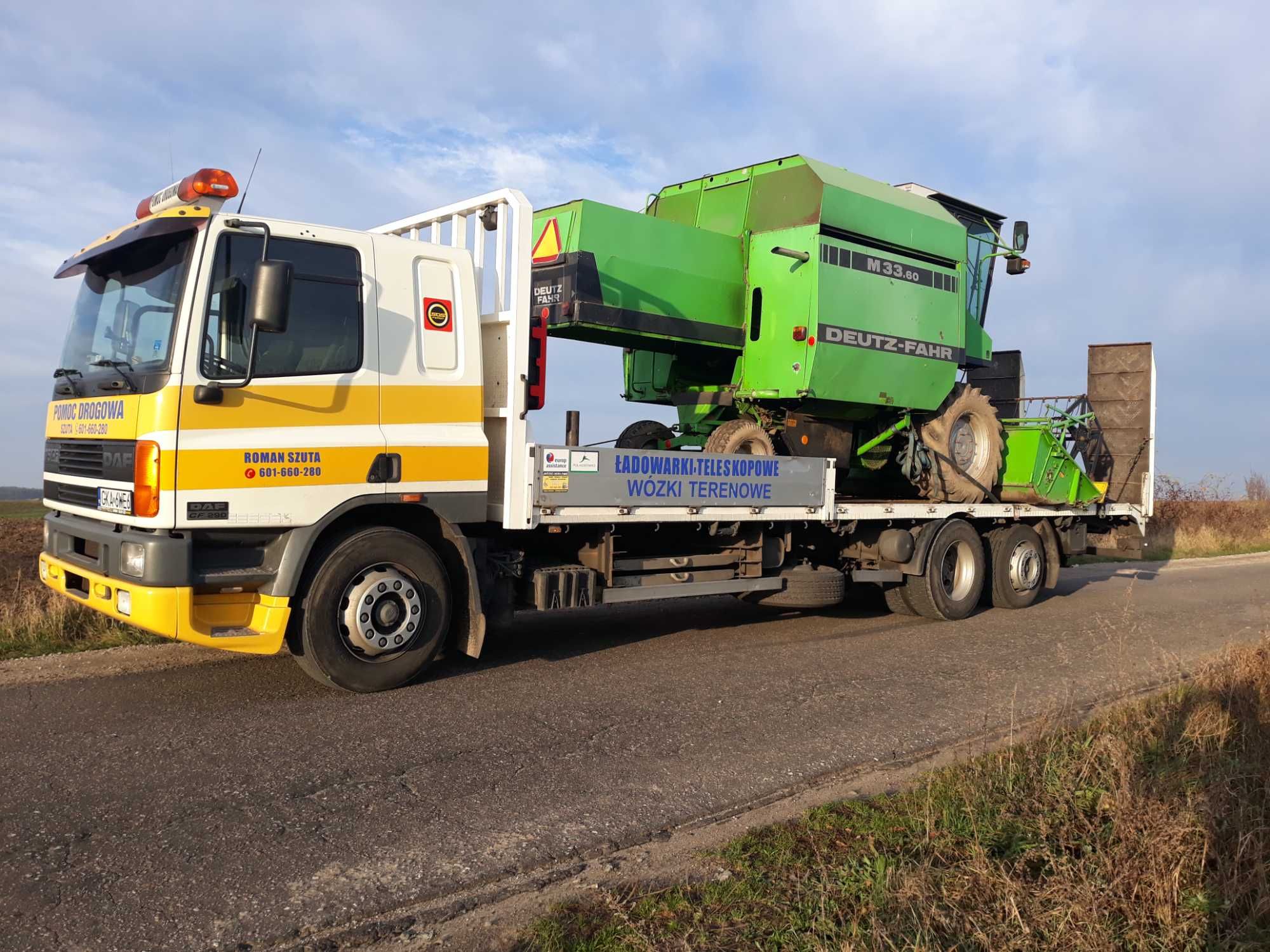 Transport maszyn budowlanych rolniczych wózków widłowych  holowanie