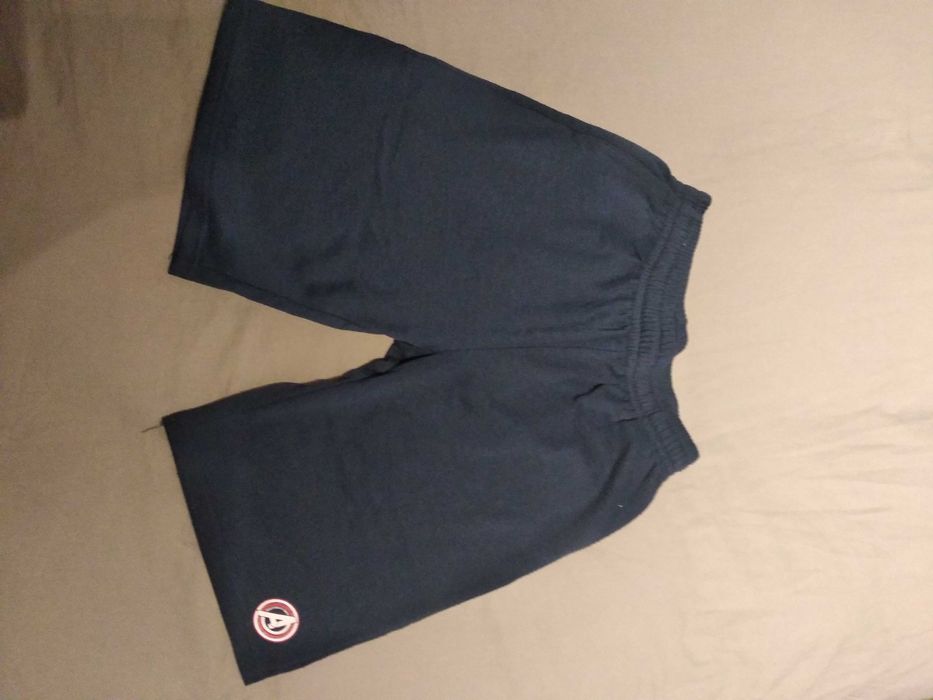 2 pares de calções em malha, tamanho 14 anos