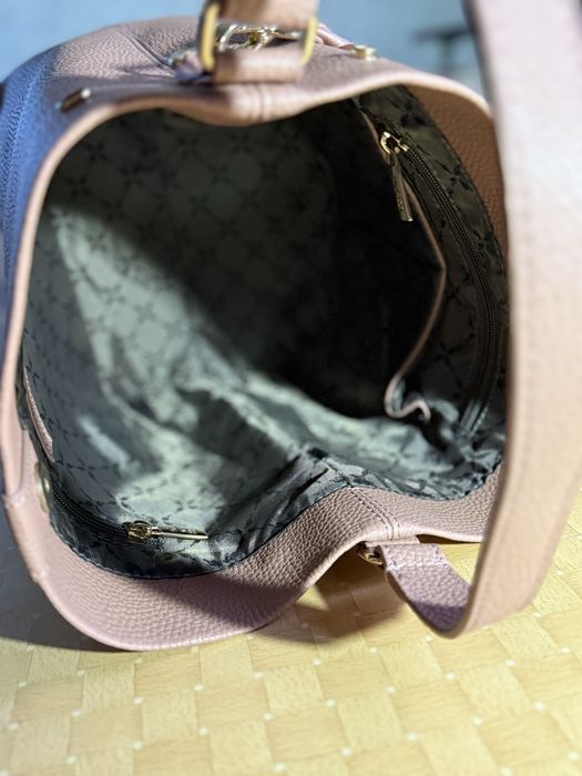 Жіноча сумка OCHNIK рожева з ремінцем