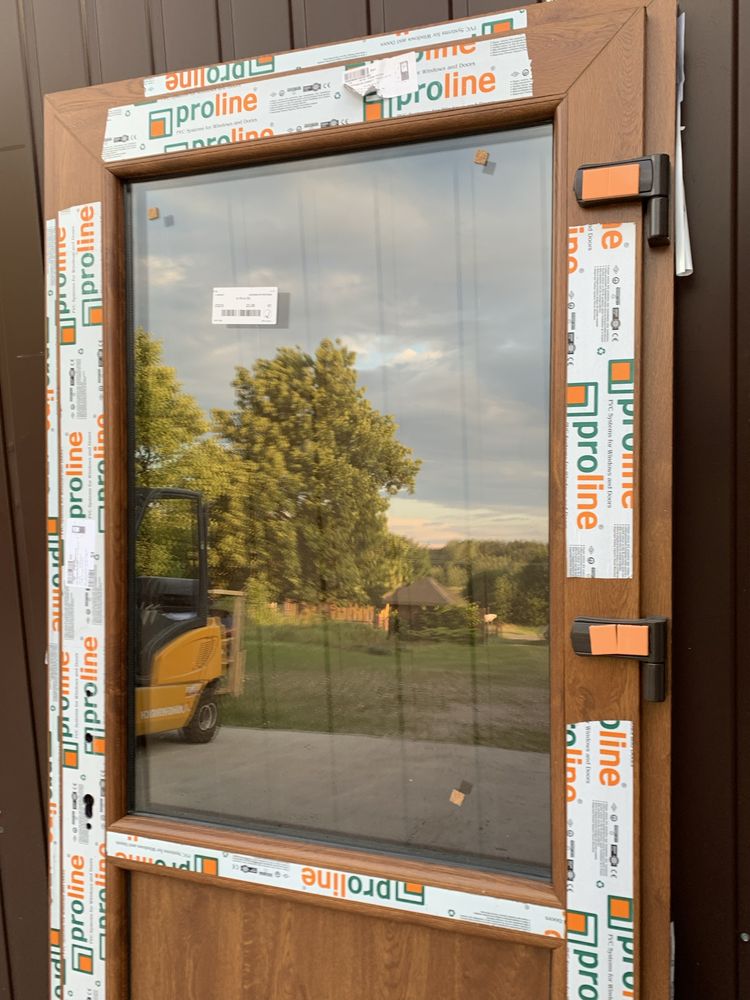 Drzwi PCV 110x210 złoty dąb