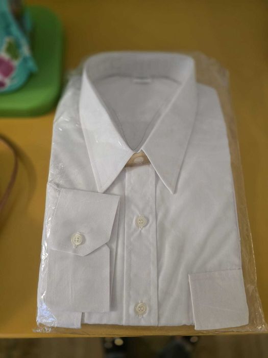 Conjunto de camisas e gravatas de farda da TAP e da Sata