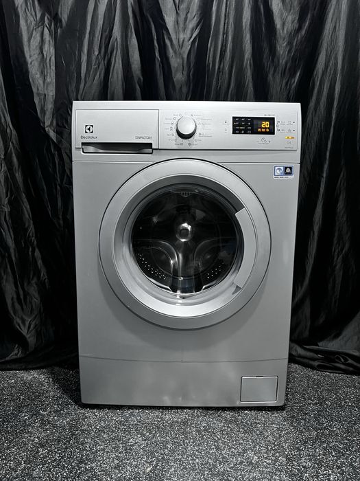 Серебристая стиральная машина Electrolux ews1064. Доставка бесплатно