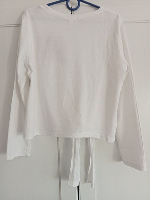 Biała bluzeczka z długim rękawem na 10 lat