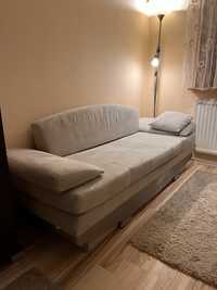 Kremowa beżowa rozkladana kanapa sofa