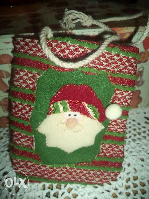Pequena bolsa em tecido com o Pai Natal
