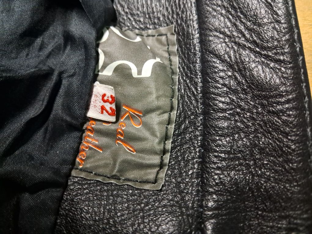 Женские кожаные штаны 32 р