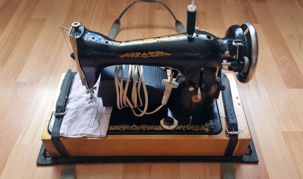 Швейная  машина...