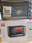 Piekarnik elektryczny Koliber 48L termoobieg,rożno,grill,wolnostojący.