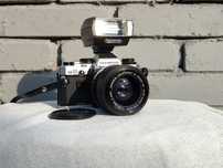 Olympus OM-10 z obiektywem Zuiko 1:4 35-70mm