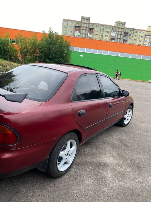 Мазда 323 , 1996р