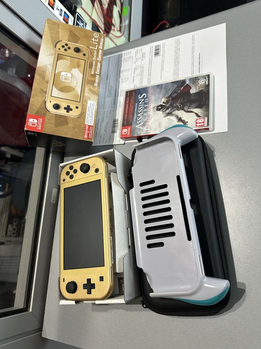 Nintendo Switch Lite Hyrule Edition + gra + case dow.zakupu z 04.2025
