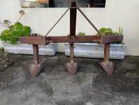 Escarificador/Arado triplo trator