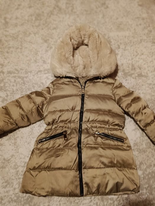 Гарненька зимова курточка для дівчинки 120см