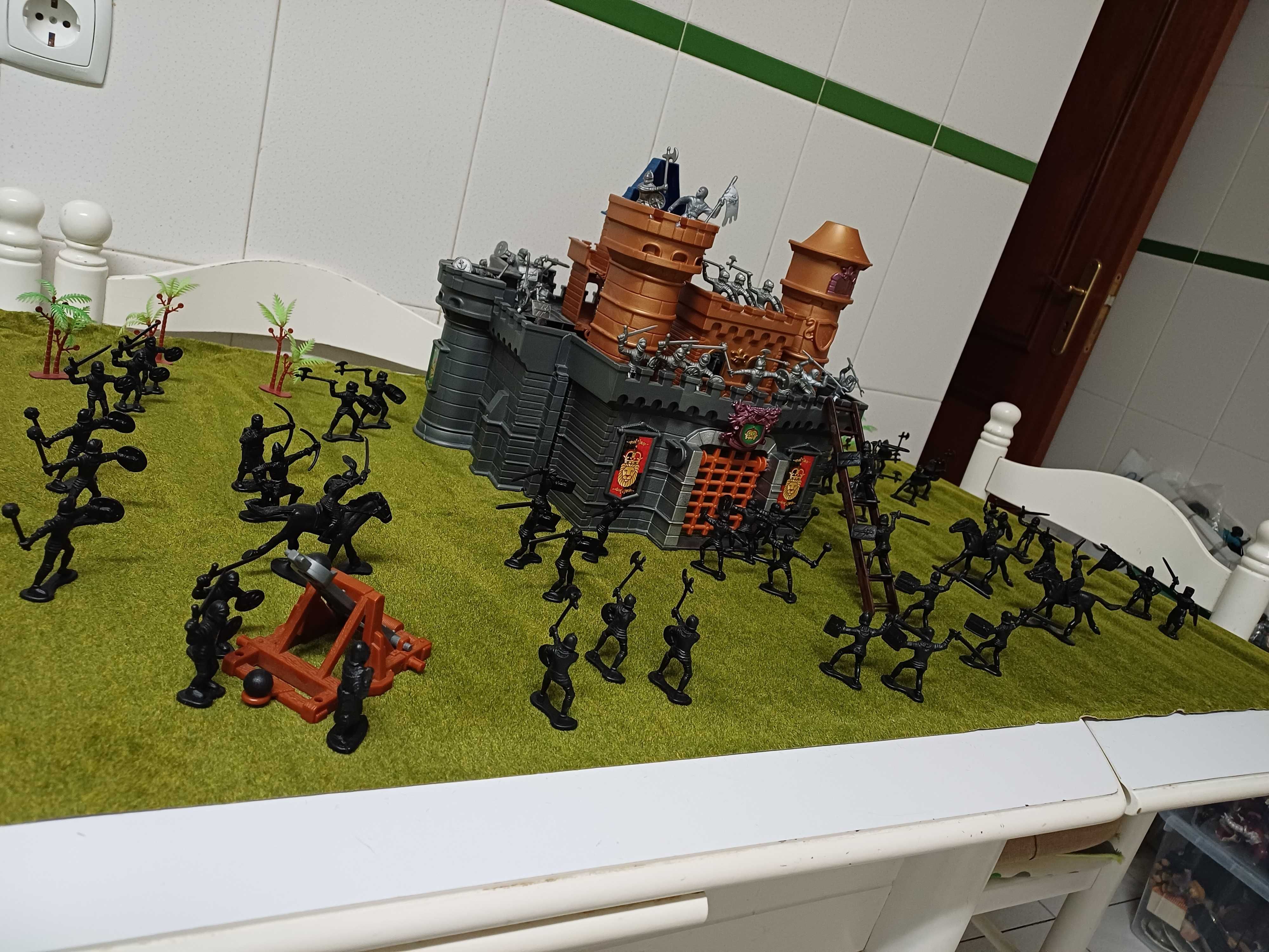Castelo com exércitos em guerra