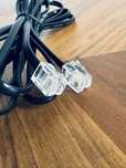 Czarny kabel telefoniczny RJ11 2m - do telefonu, modemu, faksu