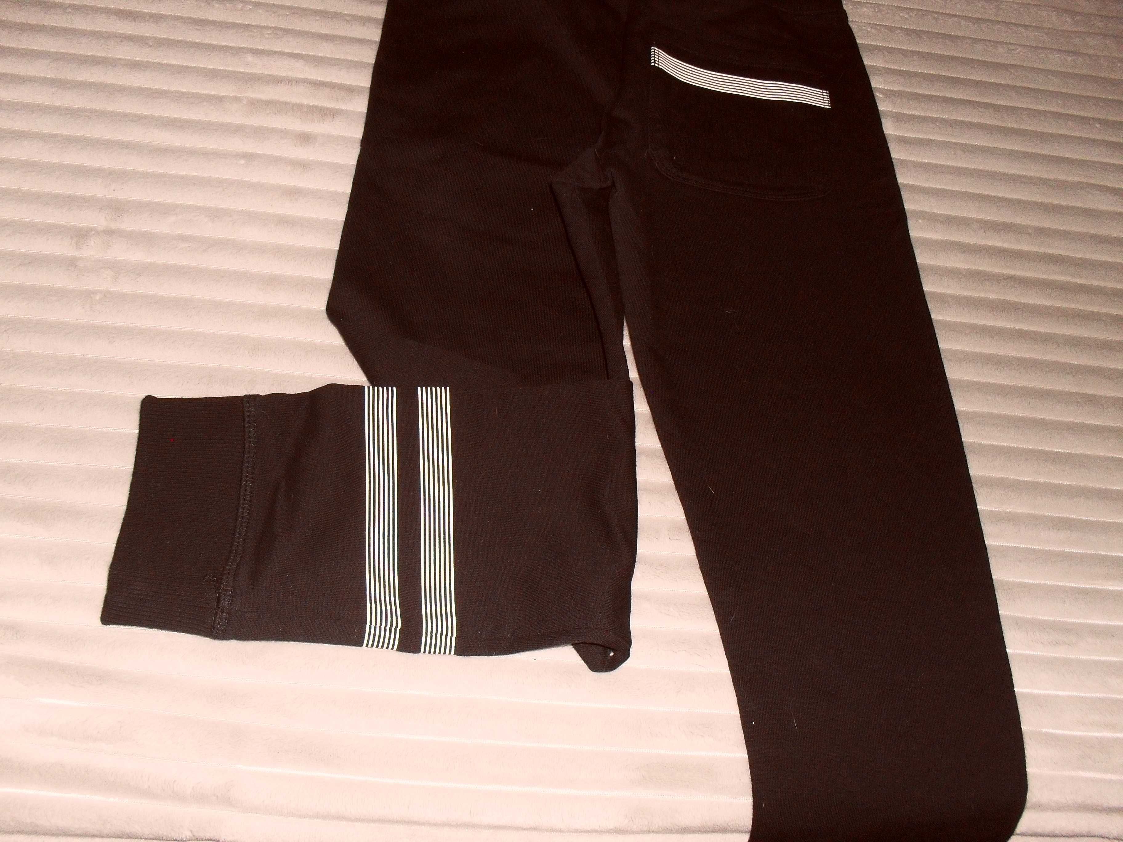 Nowe spodnie dresowe dla chlopca  czarne  128 cm firmowe DWD