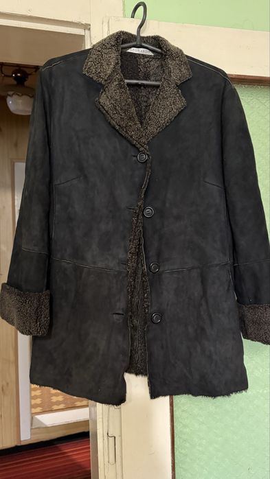 Жіноча дубленка