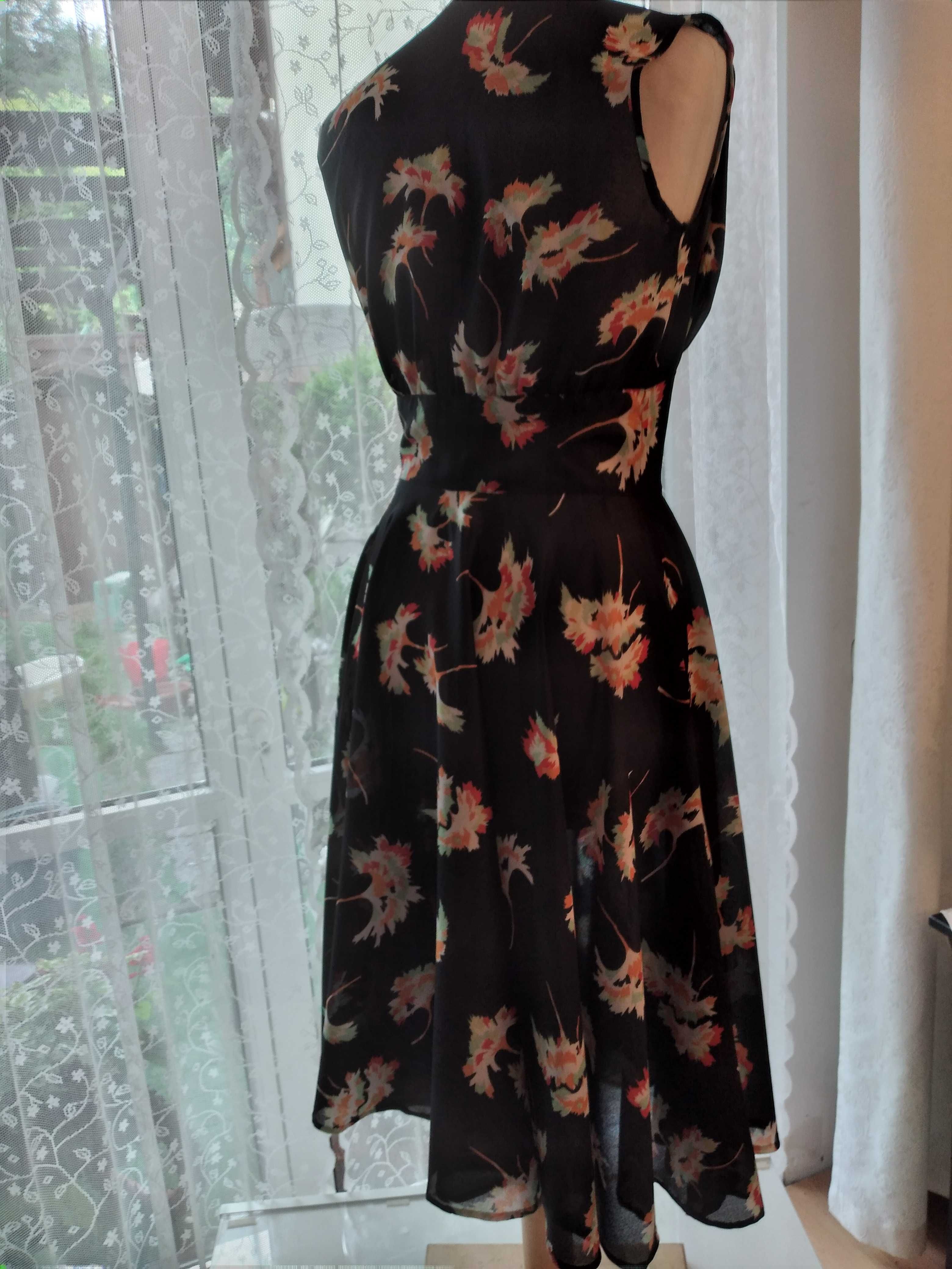 Sukienka na super okazje z czarnej żorżety w kwiaty rozm L 38-40
