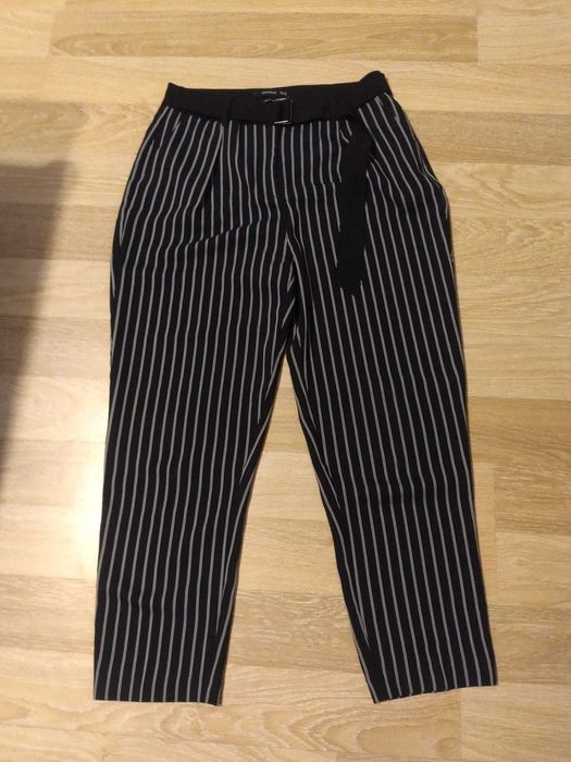 Spodnie damskie materiałowe w paski z klamrą L 40