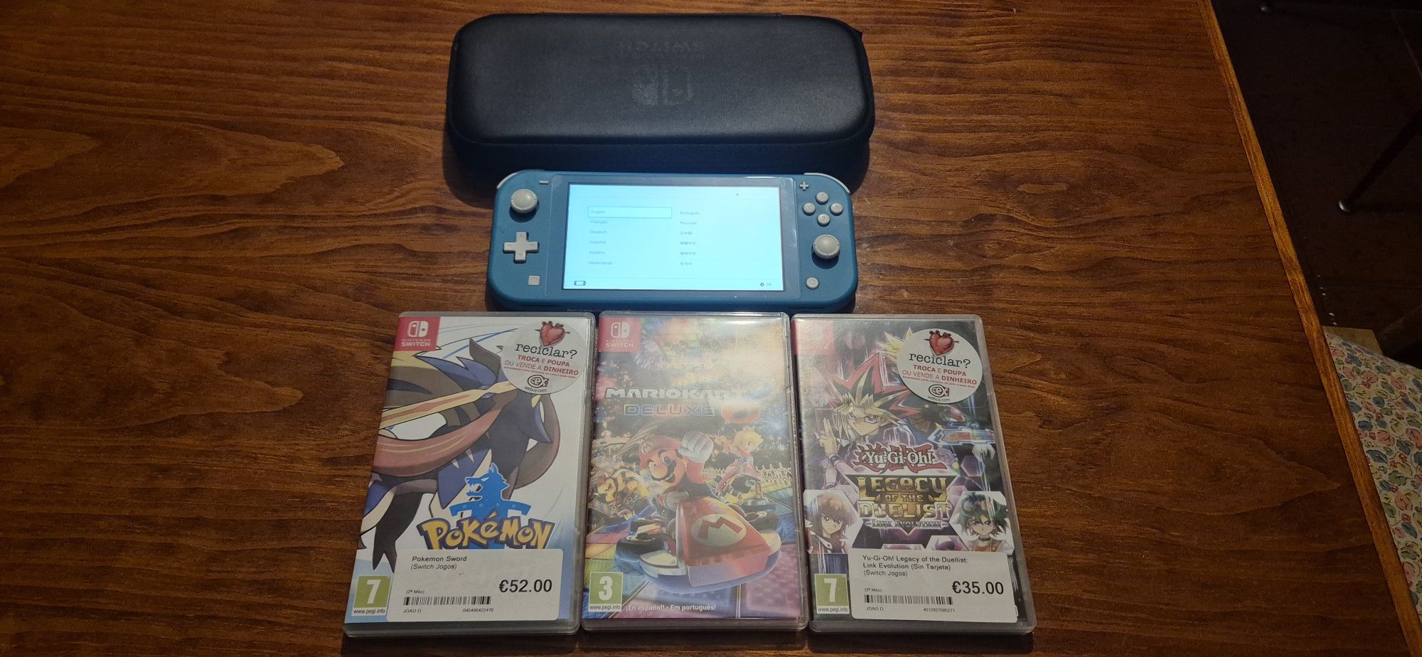 Nintendo switch lite + 3 Jogos