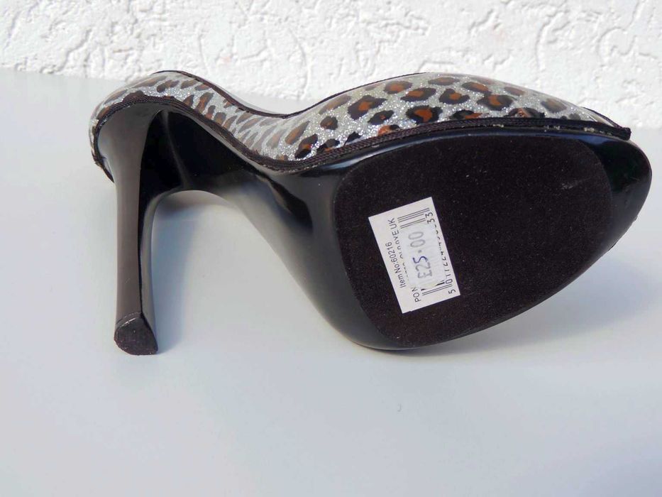 Elegancki ceramiczny but roz 43