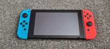 Nintendo Switch caly zestaw + 4 gry