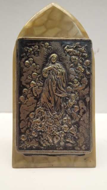 Antigas molduras religiosas em metal e baquelite