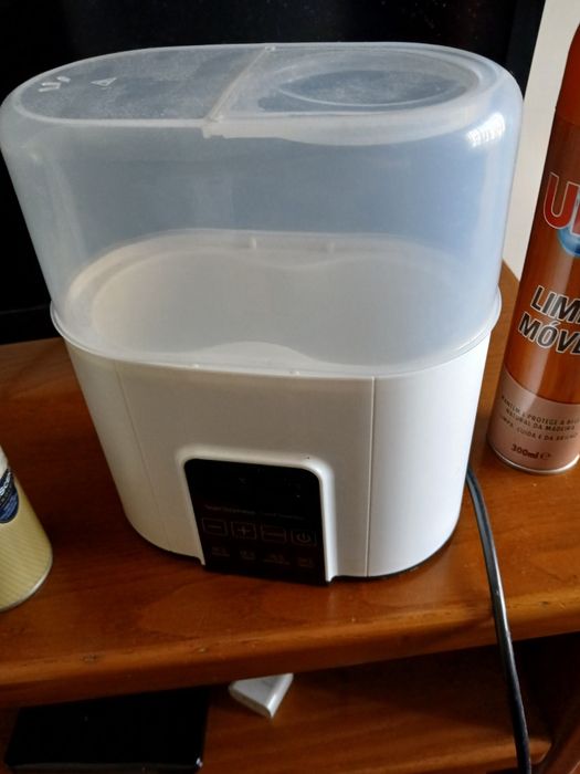 Esterilizador e aquecedor de biberões