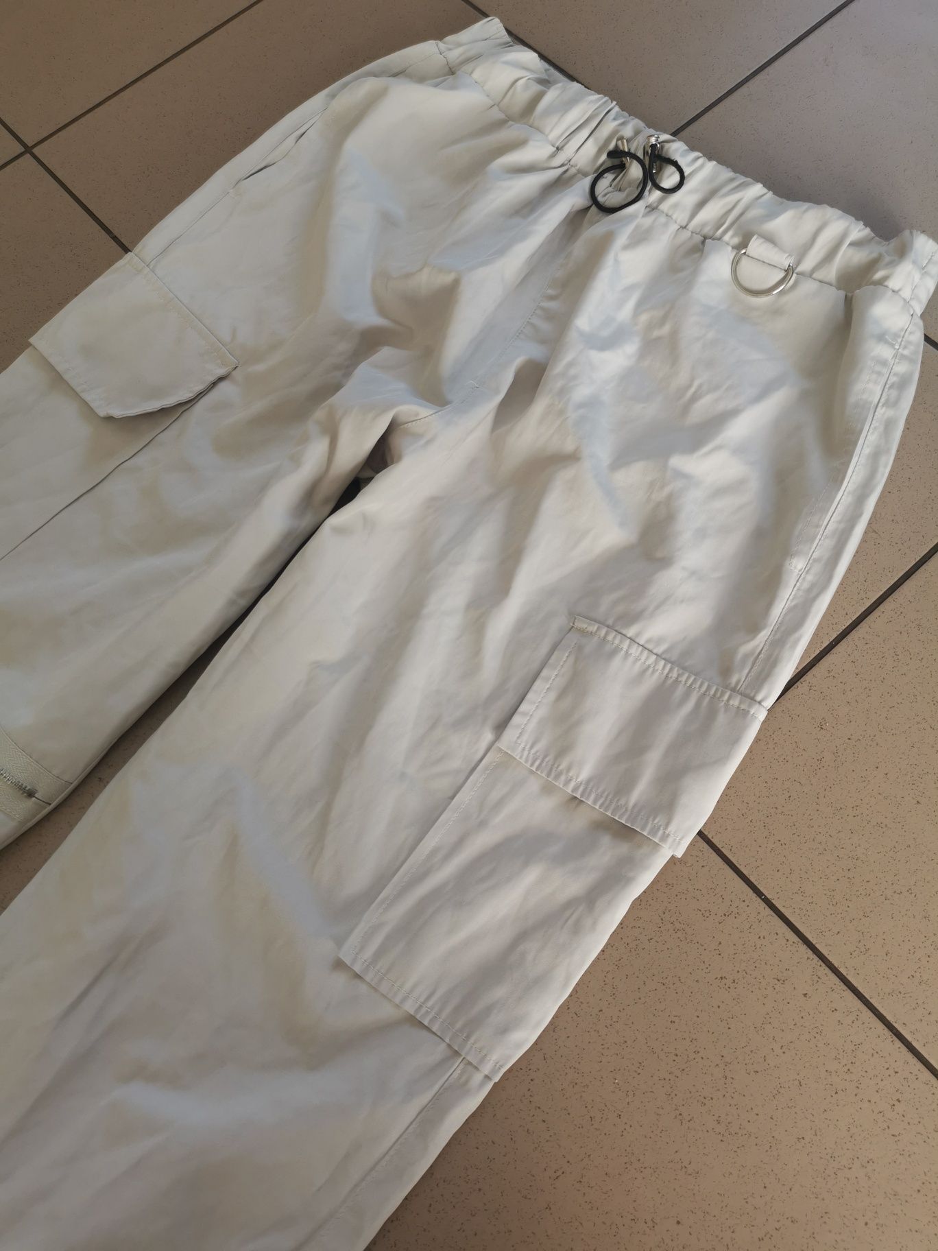 Joggery bojówki damskie ze ściągaczami wysoki stan r 40