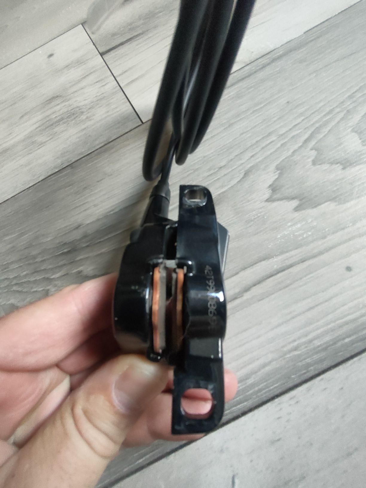 Zacisk hamulca hydraulicznego sram