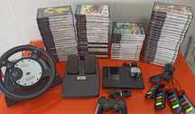 Pack PlayStation 2 + Demos e DVDs + jogos e volante ps2 + buzz ps2