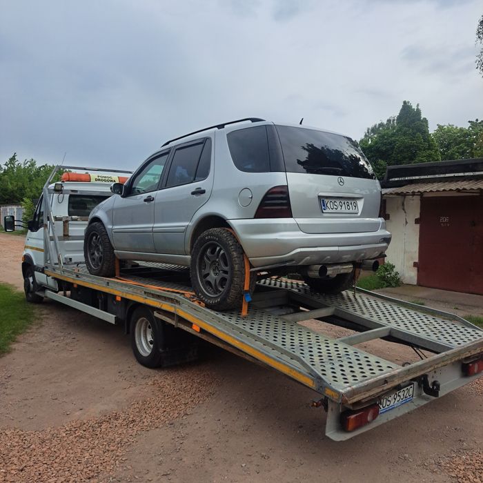 Laweta Pomoc Drogowa Holowanie Osobowe Dostawcze Transport Maszyn