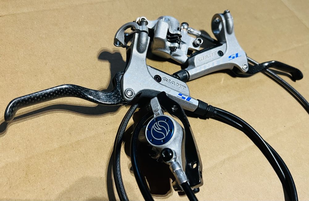 Hamulce hydrauliczne tarczowe GIANT ROOT SL Klamki CARBON Zaciski NOWE