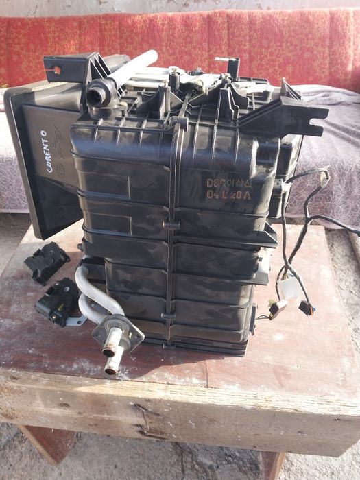 Обігрівач салону та радіатор пічки Кіа Соренто 1