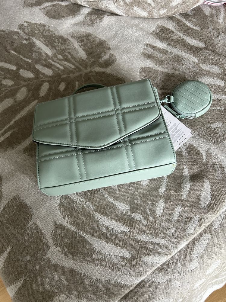 Bolsa tiracolo com moedeiro