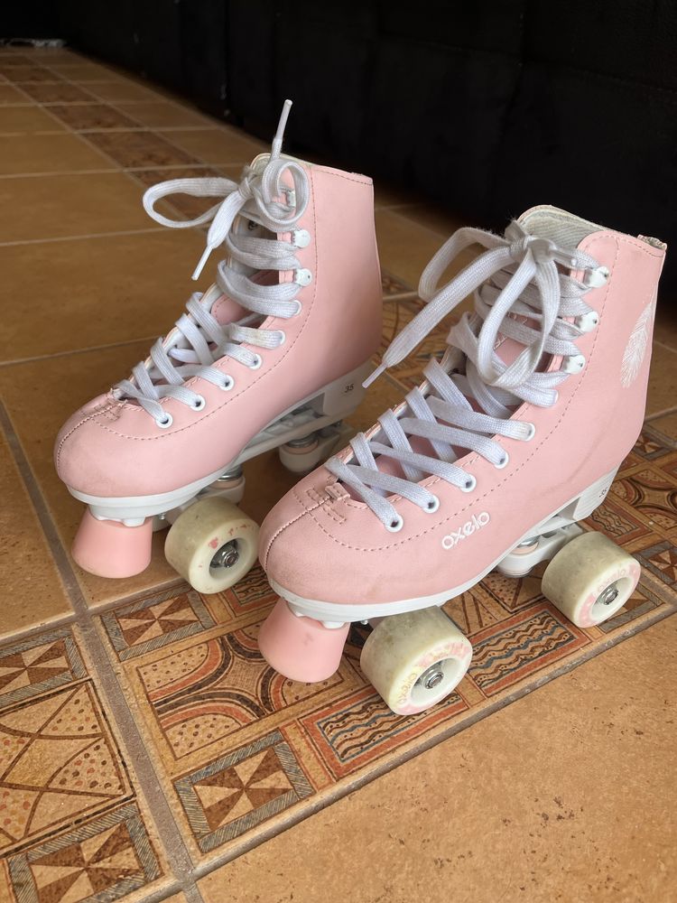 Patins de menina rosa com oferta joelheiras