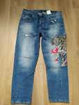 Kultowe jeansy Guess