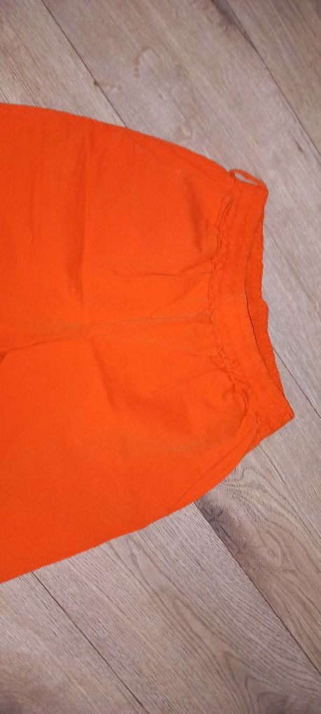 Spodnie pomarańczowe Nowe