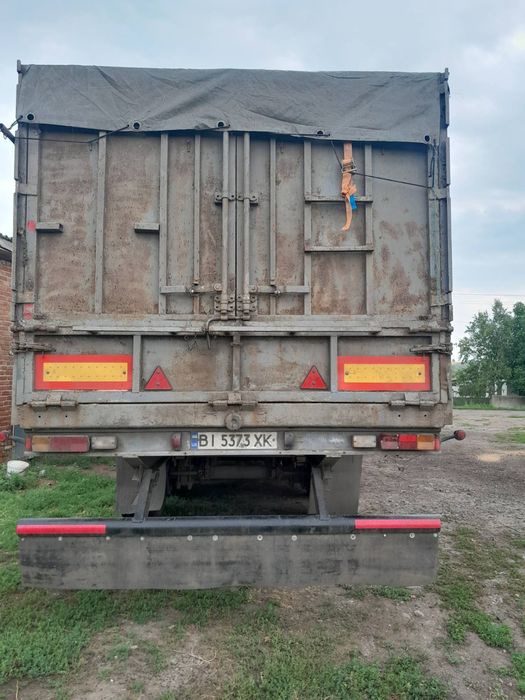 Полуприцеп МАЗ серый