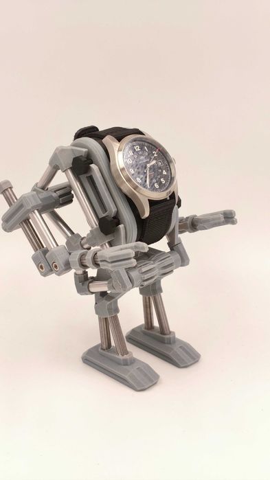 Stojak / uchwyt / stand na zegarek, robot, mech, metal, aluminium.