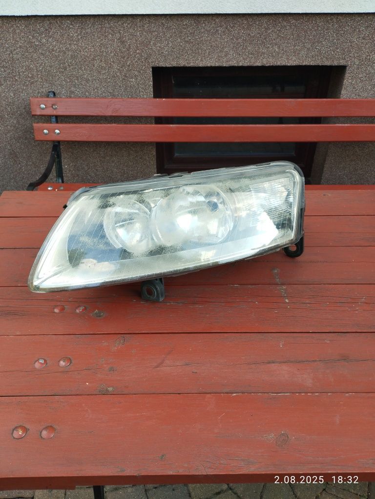 Lampy oryginalne HELLA przód Audi A6 C6