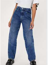 Spodnie damskie jeansowe z przeszyciami i prostymi nogawkami XL