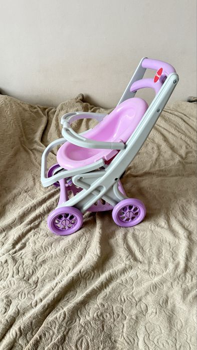 Пластикова коляска для ляльок doloni