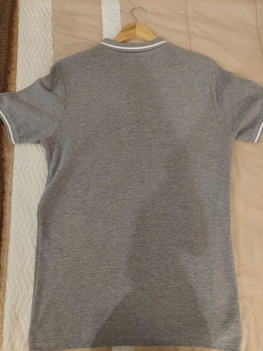 Pólo desportivo como novo