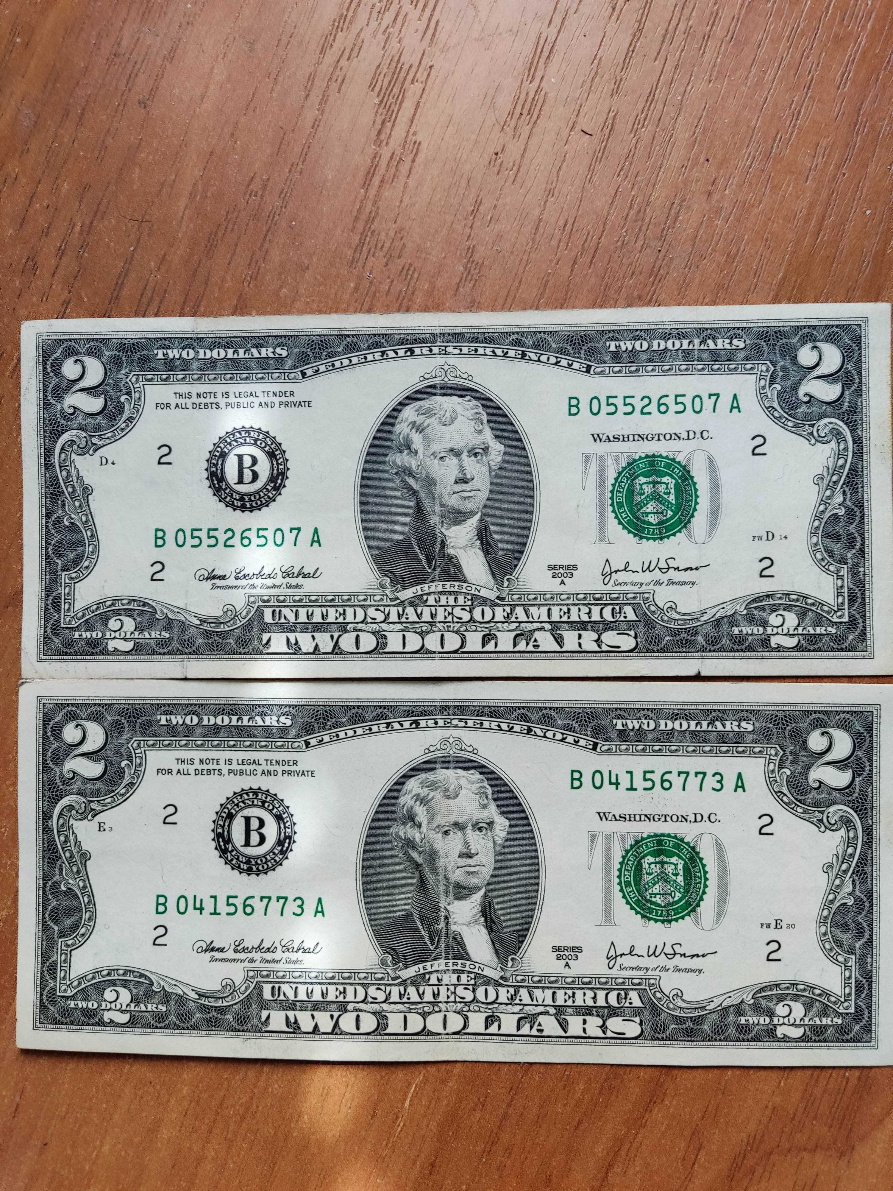 Банкноти $ 1 та 2 рiзнi Роки.