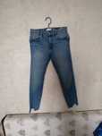 Spodnie damskie jeansy poszarpania Sinsay S36
