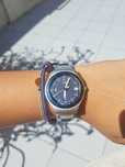 Relógio Swatch prateado e azul