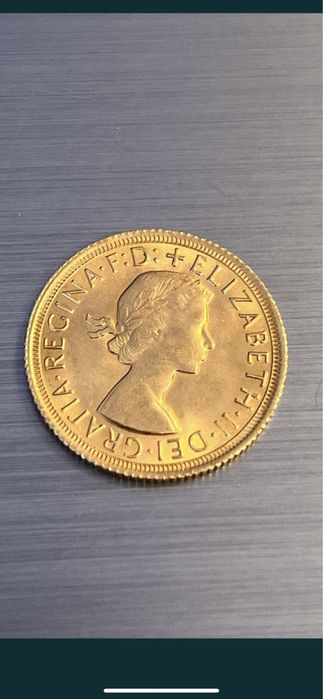 Золотая монета Elizabeth II инвестиционная Британский Соверен 1964 г.