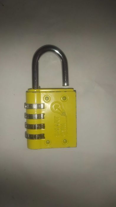 Kłódka  z kodem 4 pierścienie nowa żółta fitness