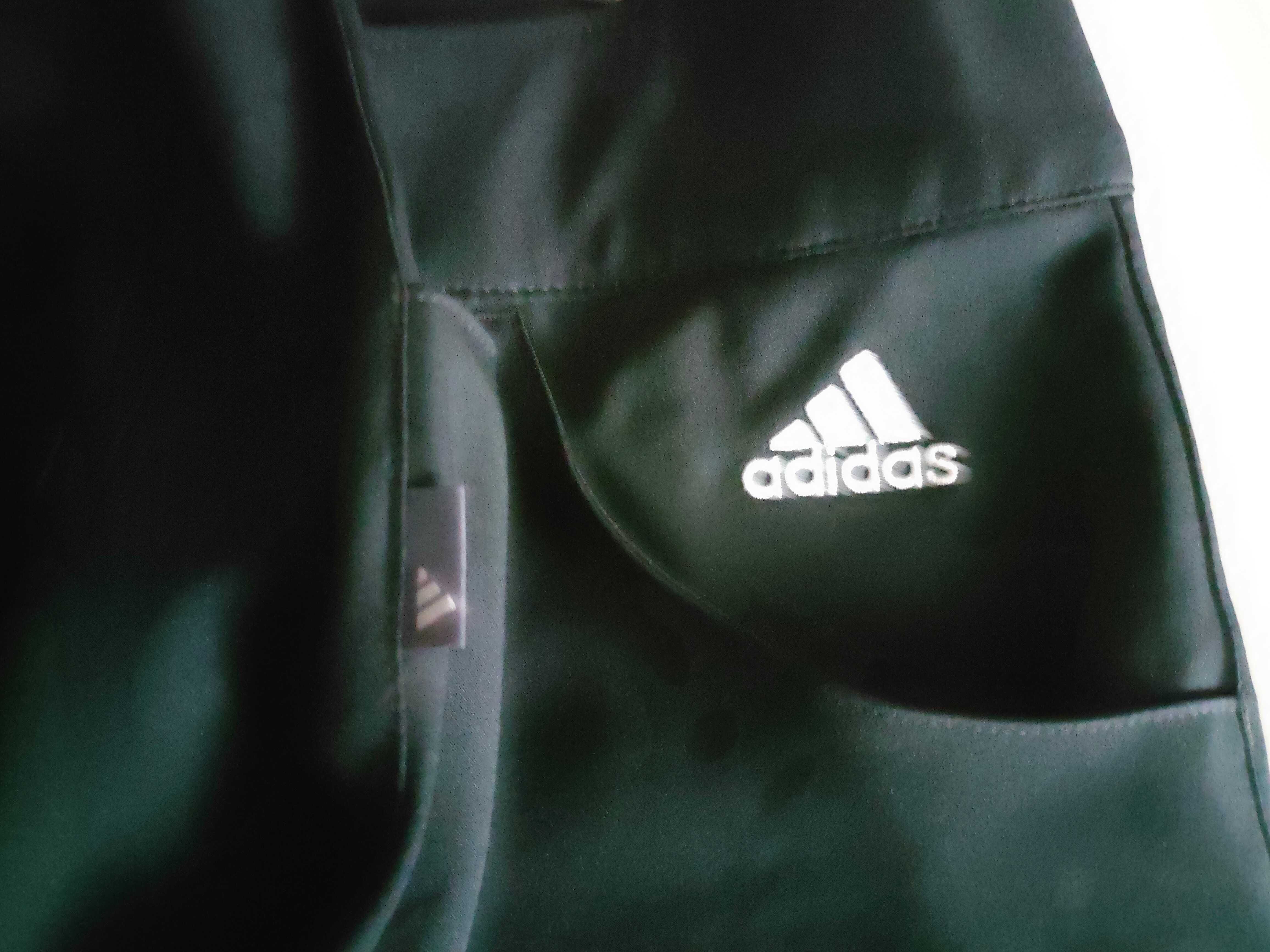 świetne spodnie ADIDAS climalite , stan idealny